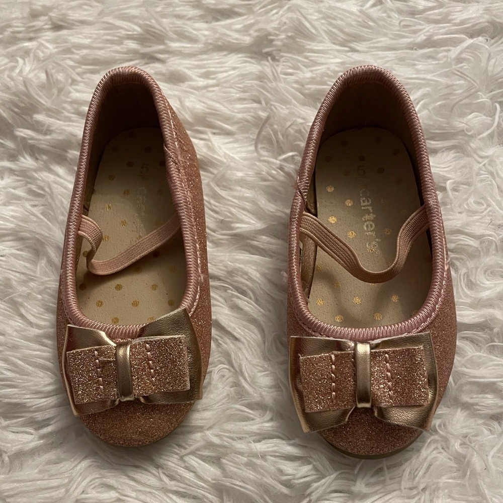 Carter’s Pink Glittery Dress Shoes.